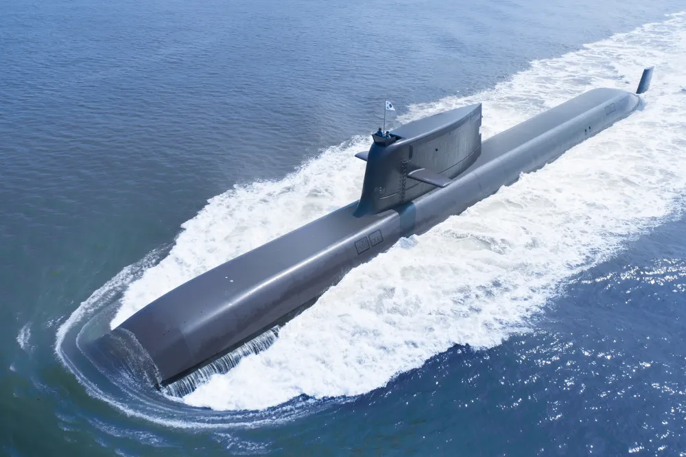 Two KSS-III conventional submarines operating at sea during surface transit