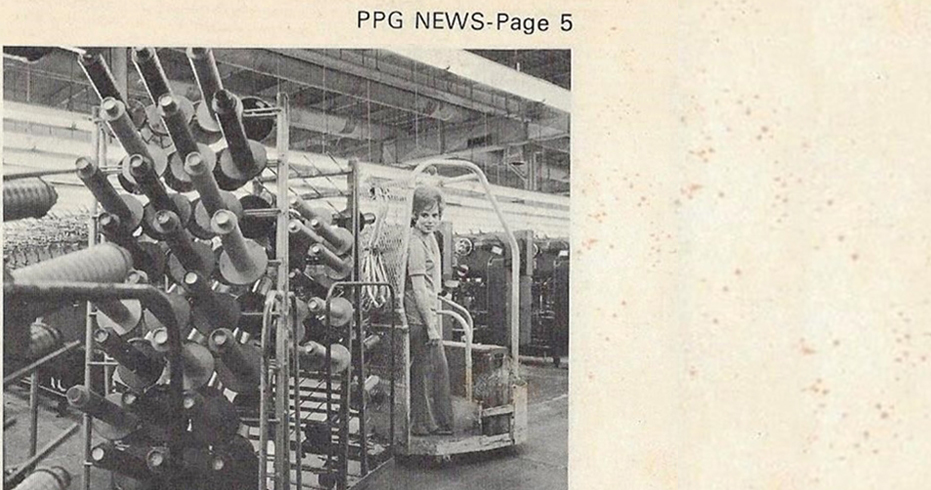 In this photo from a past employee newsletter, Smith drives an electric towmotor through the Shelby plant