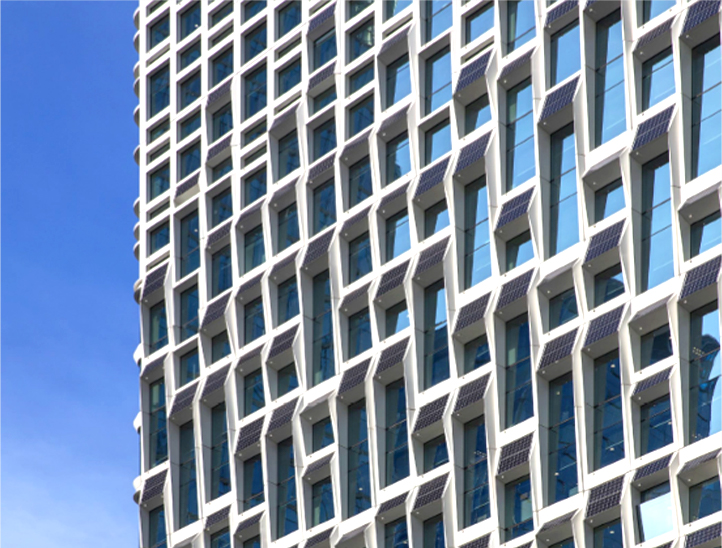 Solar panels are visible above the windows of Hanwha's headquarters as part of its sustainable architecture