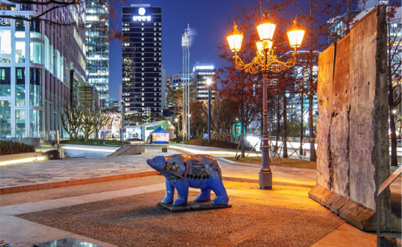 In the spirit of renewable energy, Hanwha HQ's restored Berlin Plaza showcases a piece of the Berlin Wall