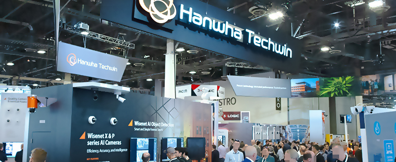ISC West 2022 attendees explore  Hanwha Techwin(Currently Hanwha Vision)’s display featuring AI camera and video analytics solutions