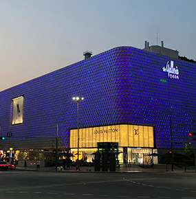 The outer facade of Galleria Luxury Hall illuminated in hundreds of blue lights in honor of World Autism Awareness Day.