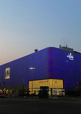 The outer facade of Galleria Luxury Hall illuminated in hundreds of blue lights in honor of World Autism Awareness Day.
