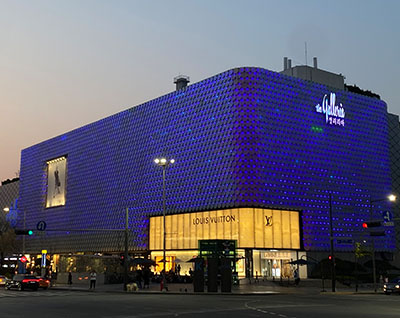 The outer facade of Galleria Luxury Hall illuminated in hundreds of blue lights in honor of World Autism Awareness Day.