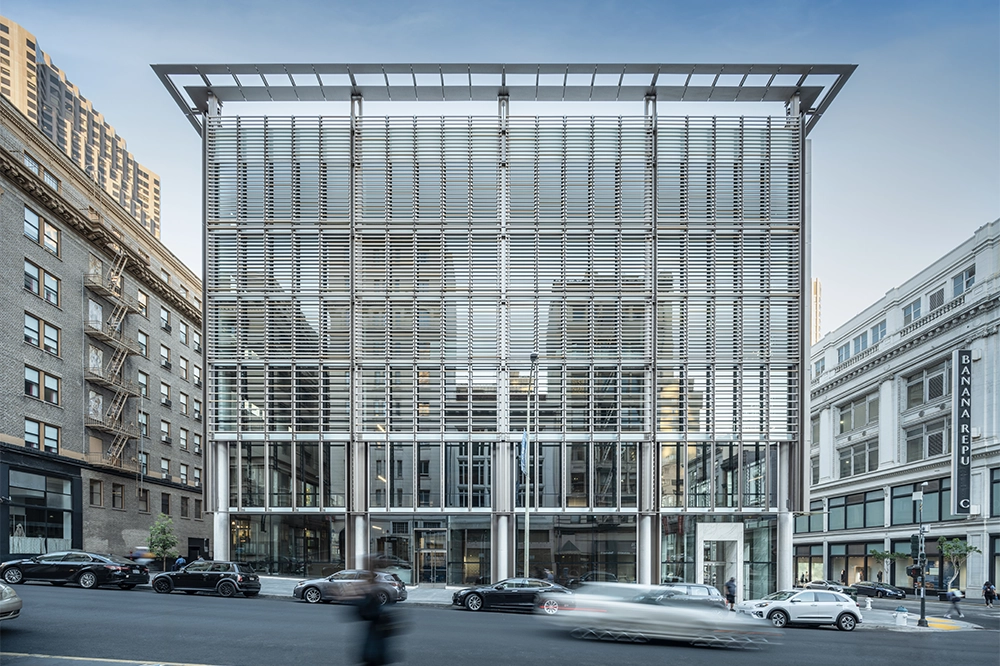 Hanwha AI Center, a modern building, pictured on a busy street in San Francisco