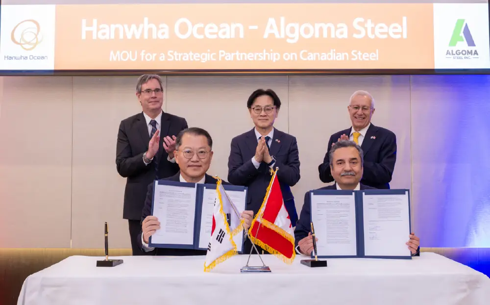 Officials from Hanwha Ocean and Algoma Steel sign a memorandum of understanding