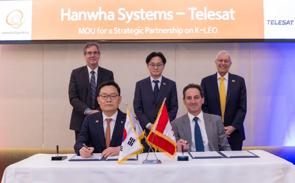 Executives from Hanwha Ocean, Cohere, and Hanwha Systems mark the signing of an MOU on marine AI collaboration