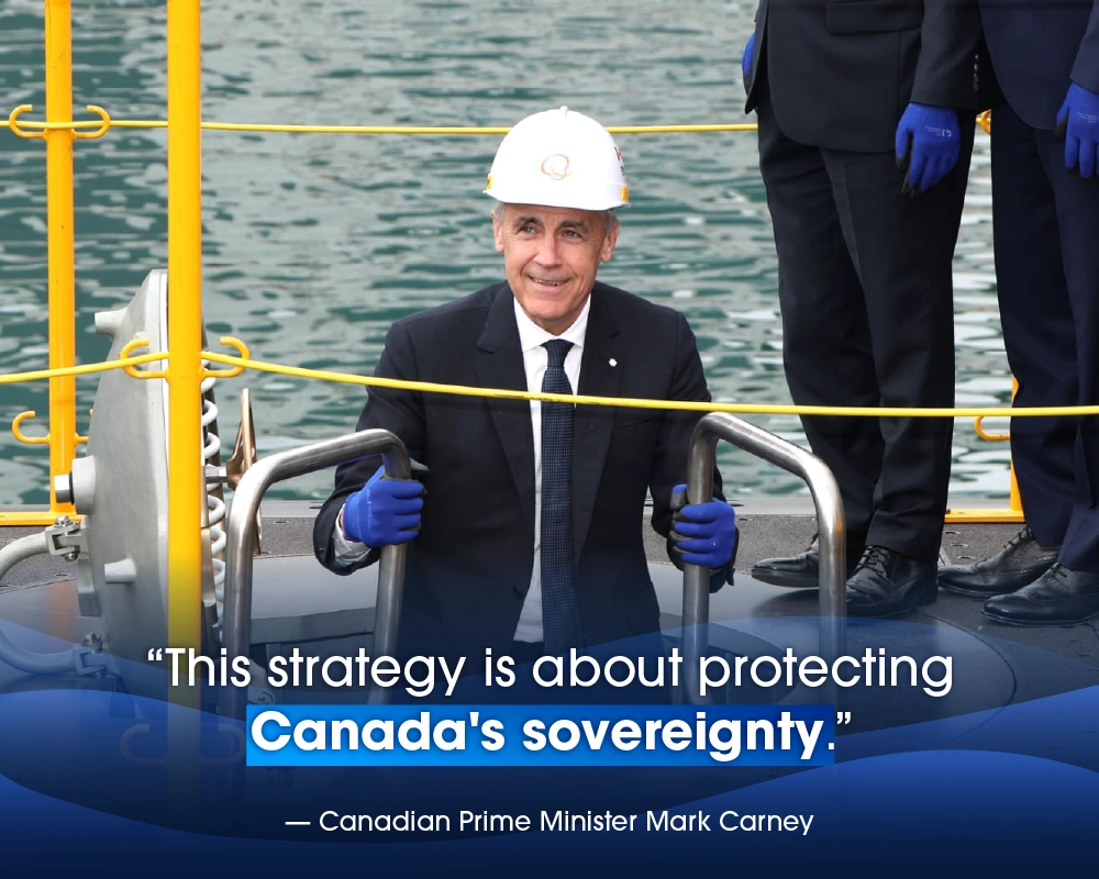 Canadian Prime Minister Mark Carney climbs out of a submarine at Hanwha&rsquo;s Geoje shipyard.