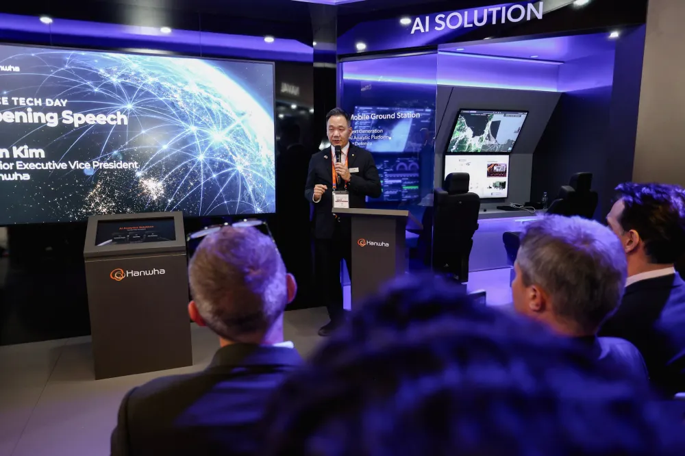 Sun Kim, Head of Space Business at Hanwha Systems, speaks to an audience at the Hanwha booth at MSPO 2026.