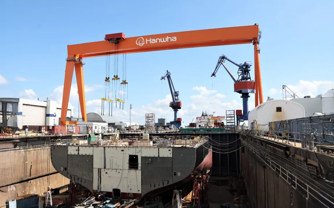 A Goliath crane over a ship under construction at Hanwha Philly Shipyard
