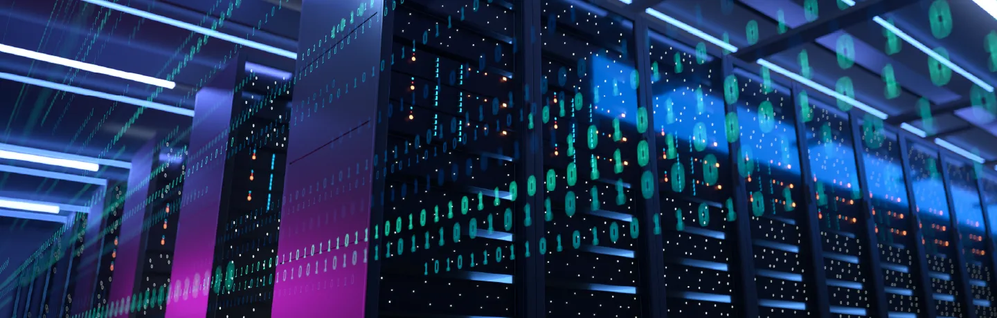 A row of illuminated server racks representing high-density data center computing and energy demand.