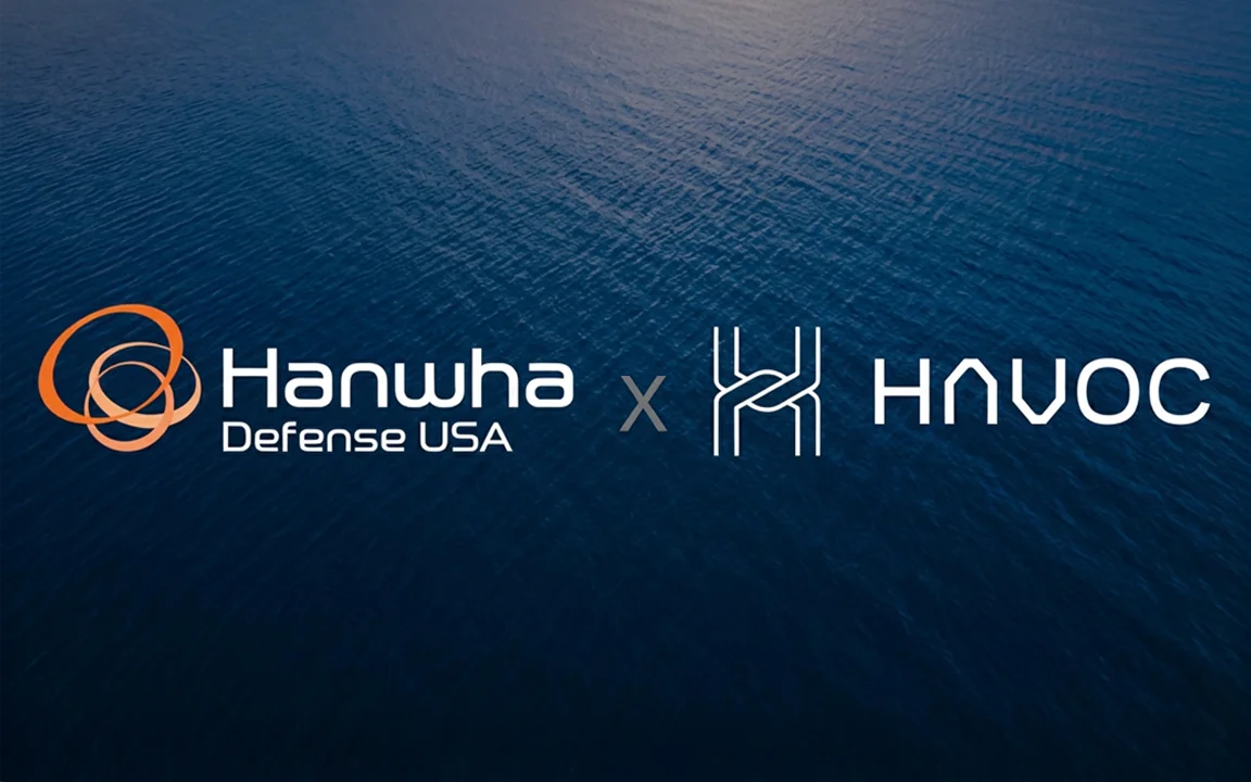 Hanwha Defense USA and HavocAI logos displayed on an ocean background.