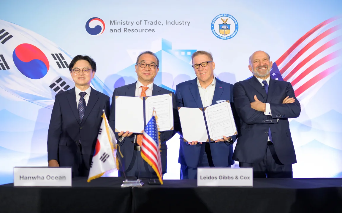 JK (Jung-Kwan) Kim, Insub Jung,  Mike Rickels, and Howard Lutnick pose after signing an MOU
